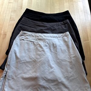Three Patagonia skorts -white, black, and gray sold as a set
